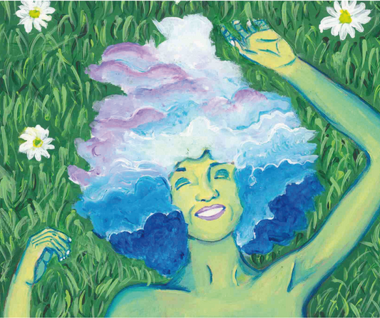 woman with cloud hair lying on back in a grass field surrounded by white flowers